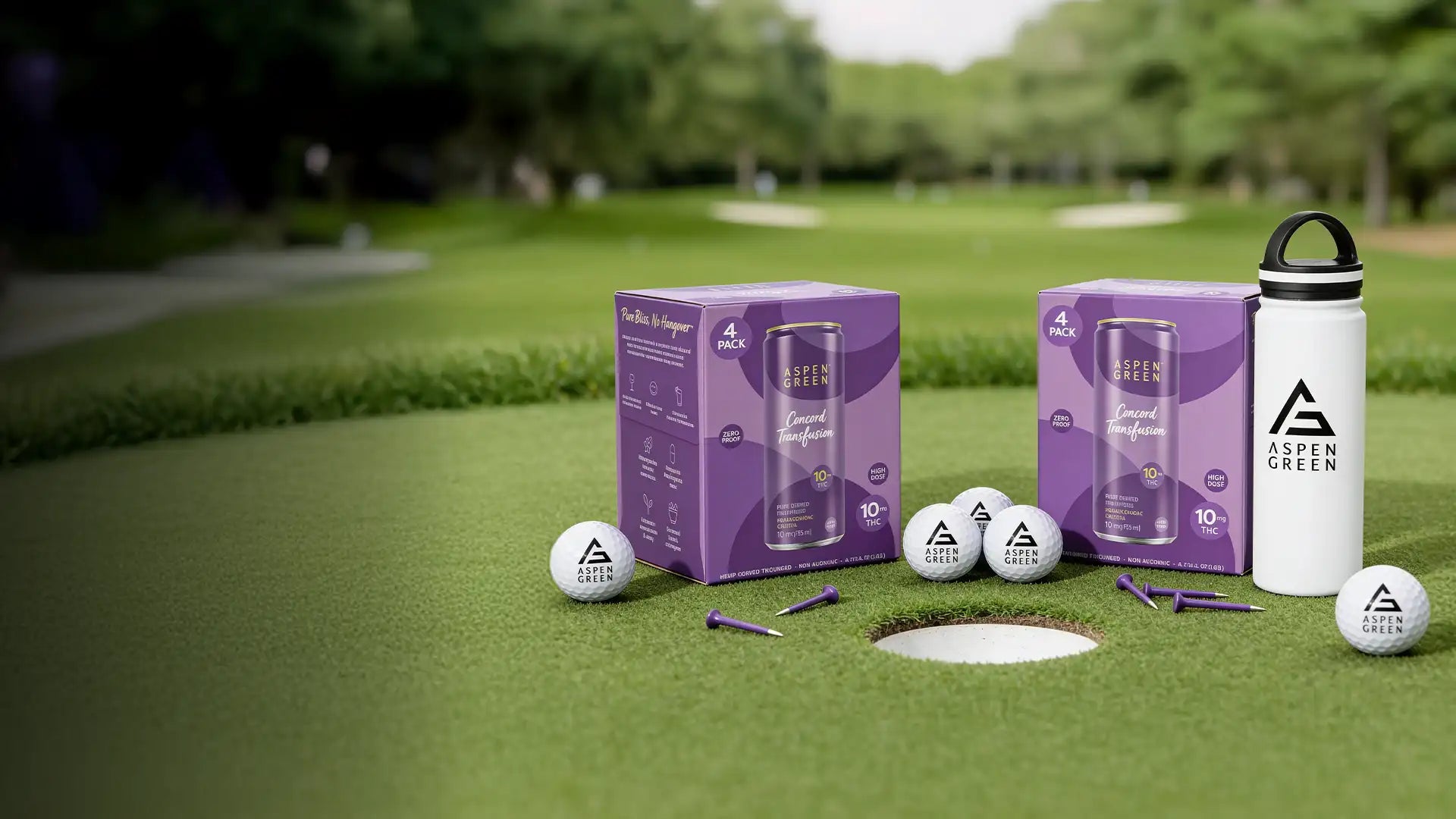 Aspen Green Concord Transfusion THC Drinks, golf balls, tumbler with handle on a golf course