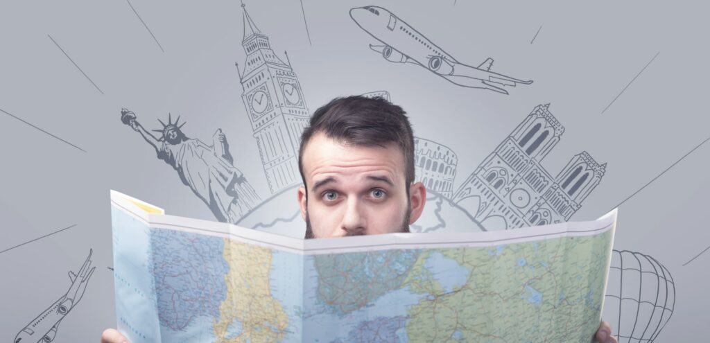 Man holding a map with famous sightseeing destinations