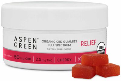 Aspen Green Organic CBD Gummies - Relief (50mg CBD) Cherry Flavor Jar with Three Gummies Next to It