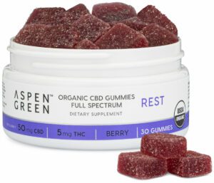 Aspen Green Rest Full Spectrum CBD Gummies - Open jar revealing USDA Certified Organic, 50mg CBD with 3 gummies next to it, Berry Flavor, 30 count