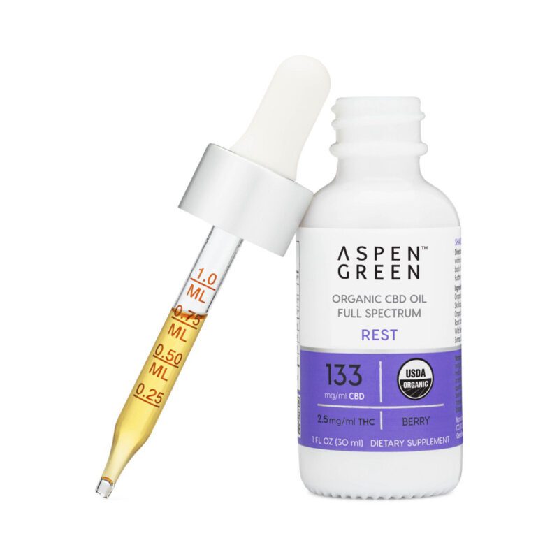 Aspen Green Rest CBD Oil tincture bottle with a dropper leaning against the bottle.