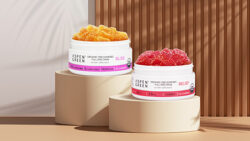 Aspen Green Bliss and Relief CBD Gummies displayed on a pedestal